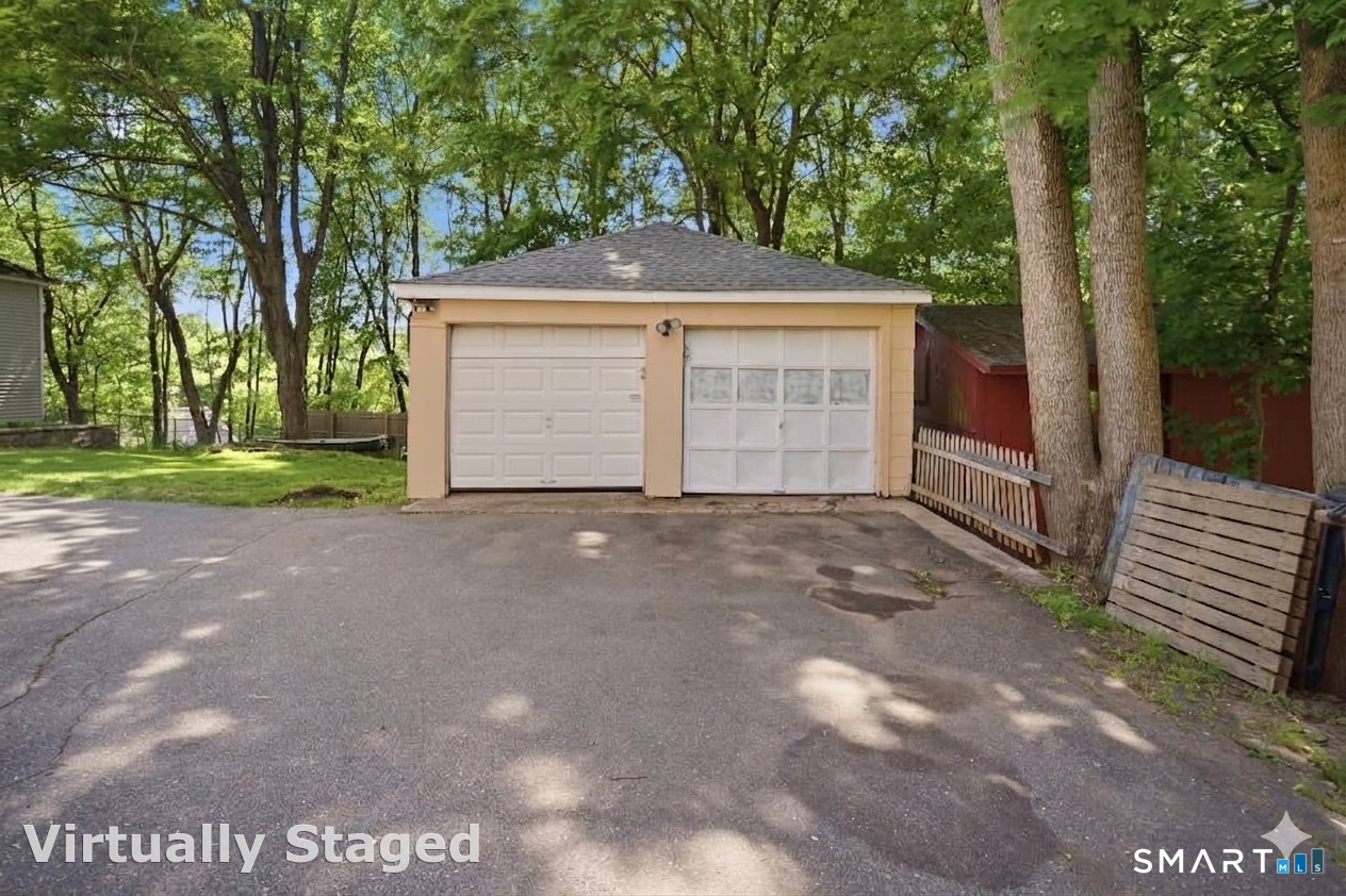 12 Webster Street Vernon, CT 06066 - Photo 31 of 33 a view of a house with a yard and garage