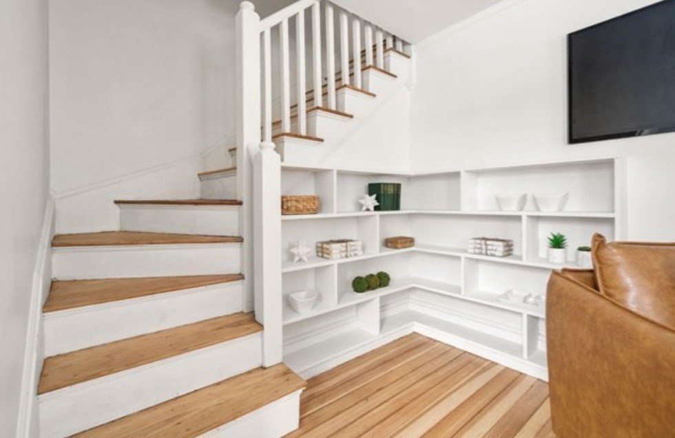 71 Highland Road, Unit 71 Brookline, MA 02445 - Photo 8 of 16 a living room with furniture and a flat screen tv