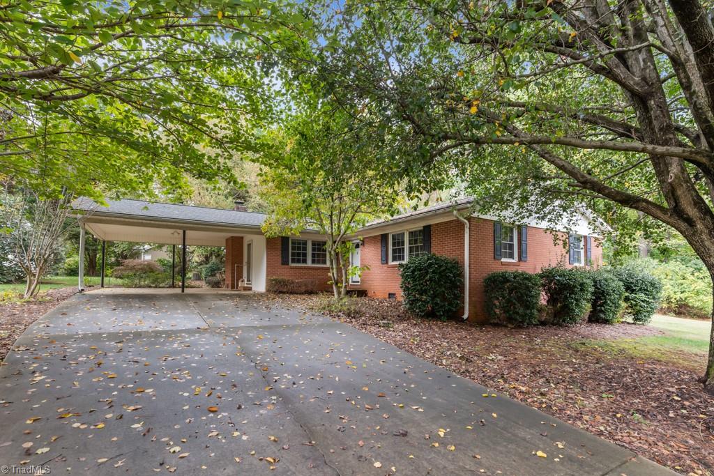 7001 Aplington Road Oak Ridge, NC 27310 - Photo 1 of 34 Beautiful, one level brick ranch in the heart of Oak Ridge