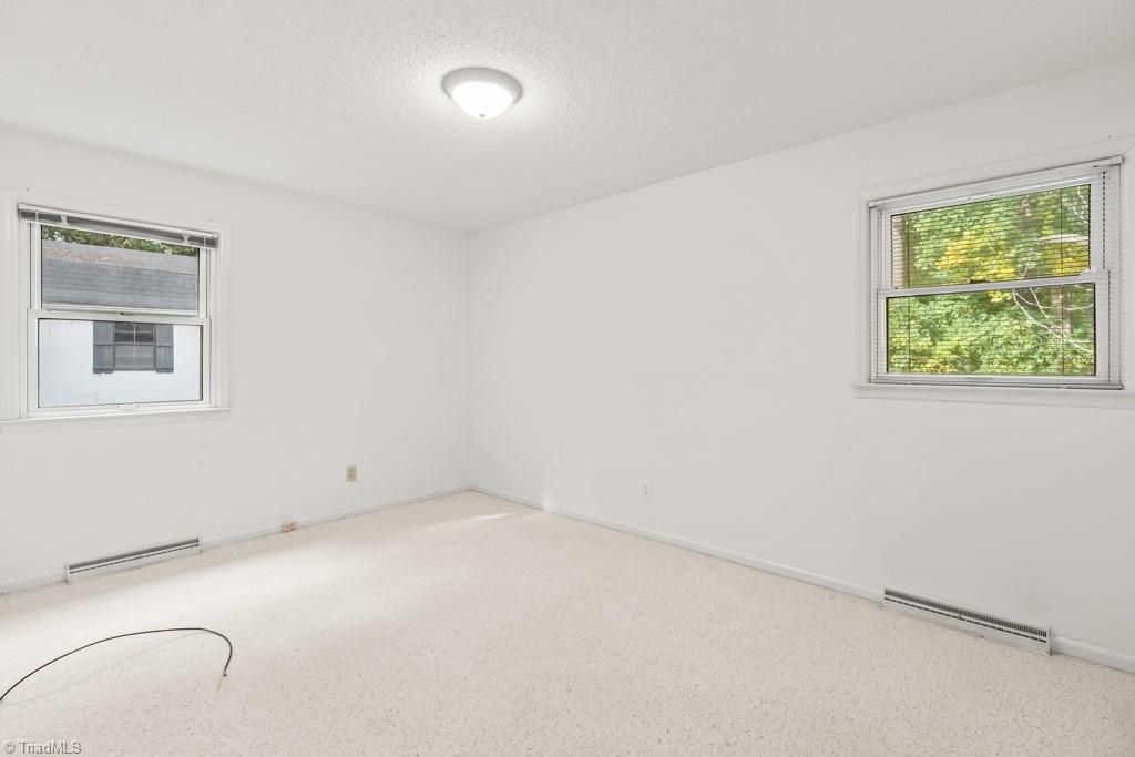 7001 Aplington Road Oak Ridge, NC 27310 - Photo 19 of 34 Second bedroom