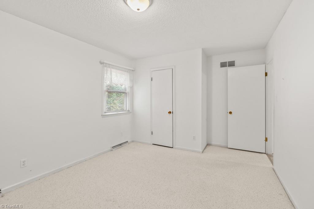 7001 Aplington Road Oak Ridge, NC 27310 - Photo 22 of 34 Third Bedroom