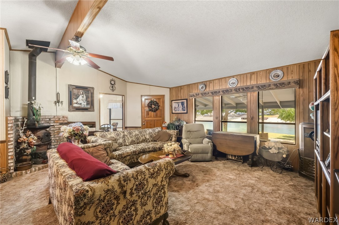 10031 Dike Road Mohave Valley, AZ 86440 - Photo 47 of 78 a living room with furniture and a large window