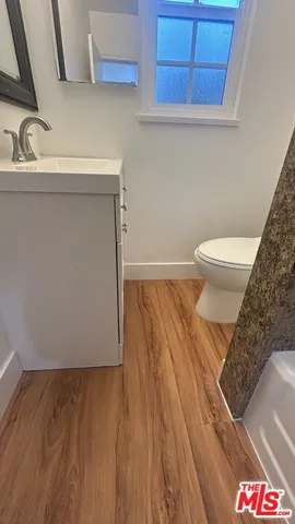 a bathroom with a sink and a toilet