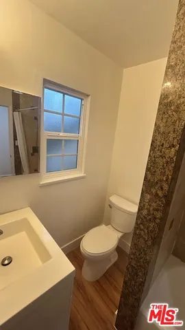 a bathroom with a sink and a toilet