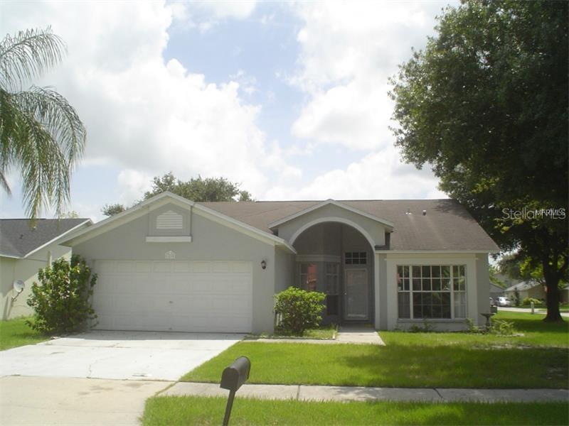 1218 Rinkfield Place Brandon, FL 33511 - Photo 1 of 1 front view of a house with a yard