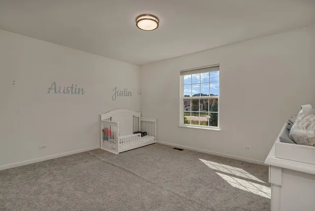 a view of livingroom with furniture and window