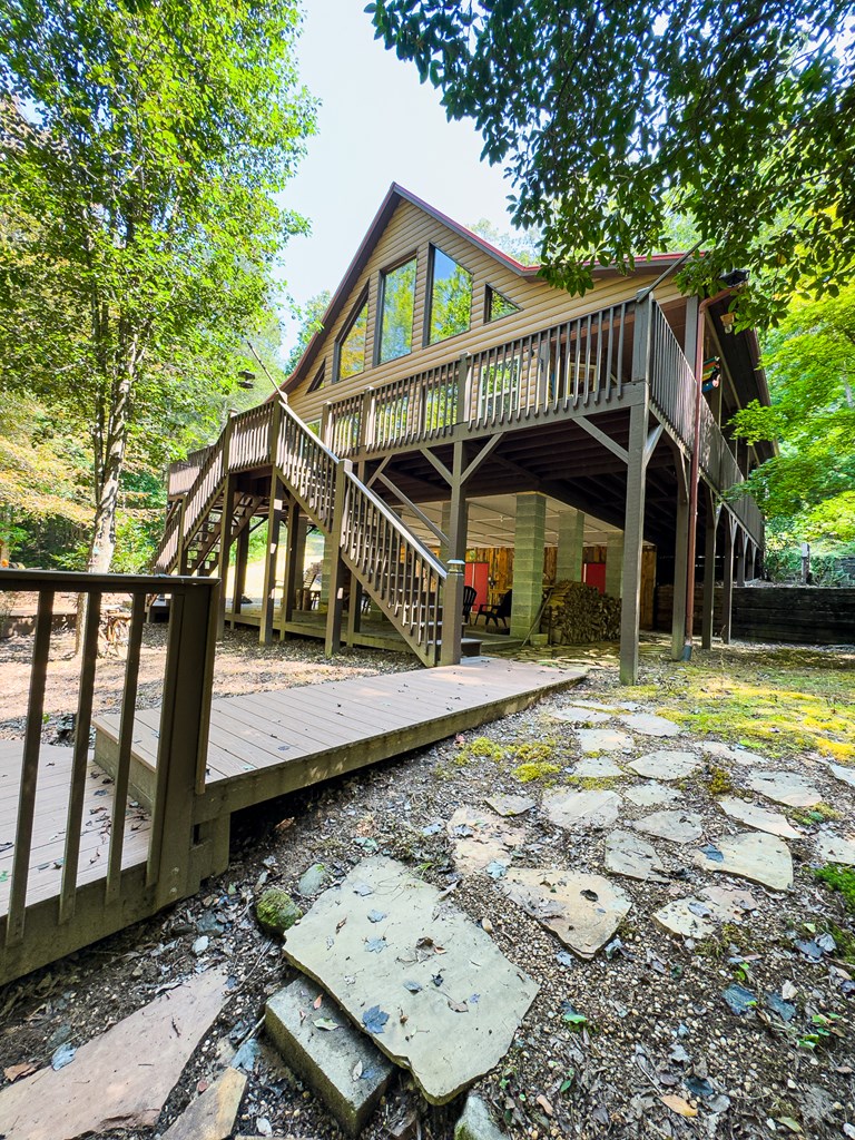 277 Virginia Lane Murphy, NC 28906 - Photo 44 of 62 a view of a house with large trees in the background