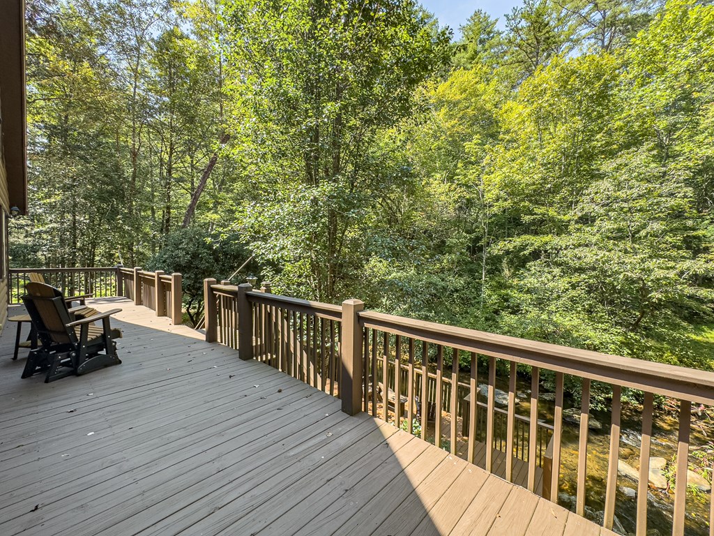 277 Virginia Lane Murphy, NC 28906 - Photo 56 of 62 a view of a deck with wooden floor and bench