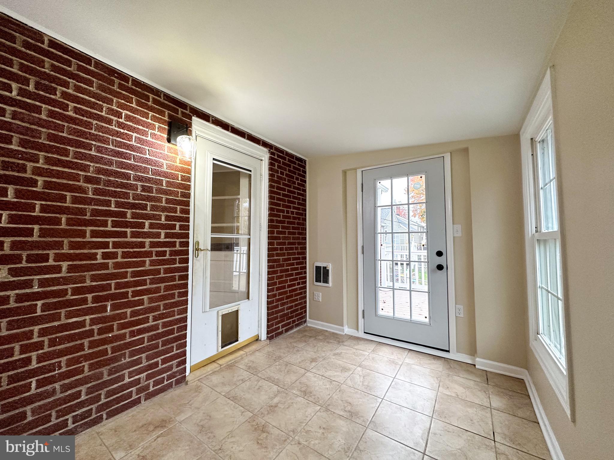 409 Rutherford Road Harrisburg, PA 17109 - Photo 23 of 47 Rear Porch /Dining Room with heater