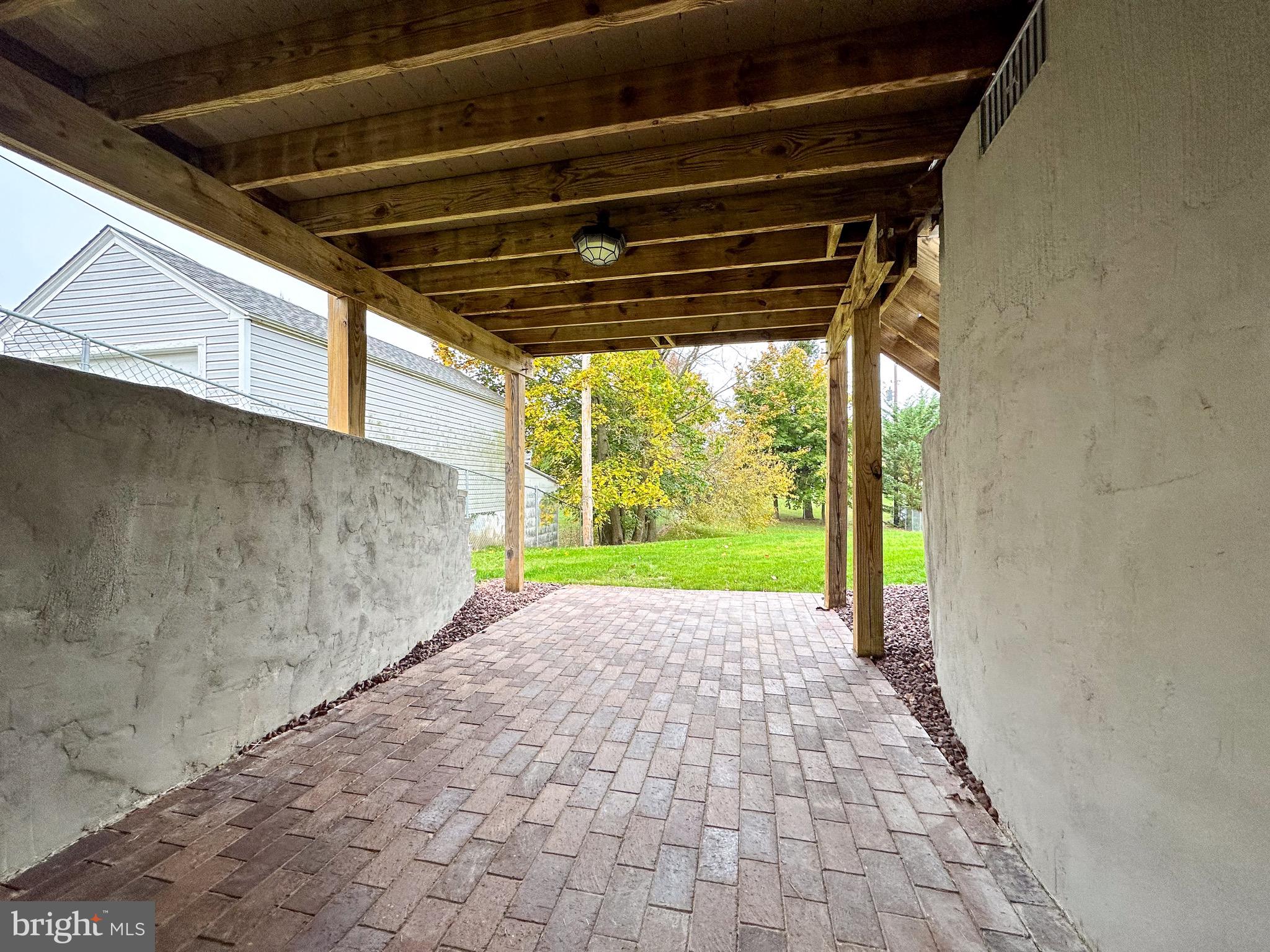 409 Rutherford Road Harrisburg, PA 17109 - Photo 37 of 47 Walkout Patio from Living room.