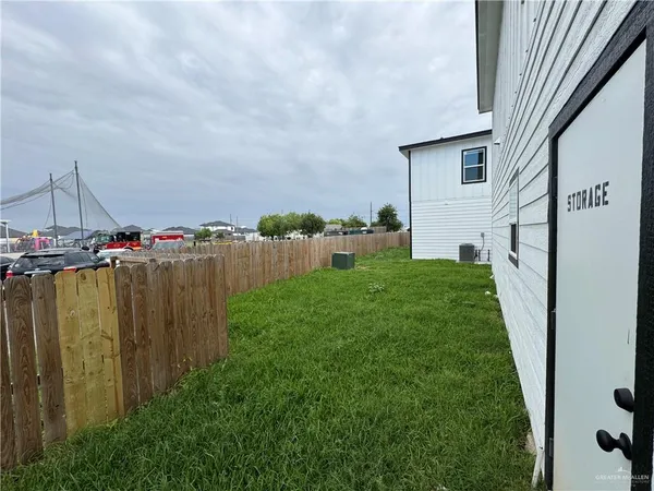 a view of a backyard with plants