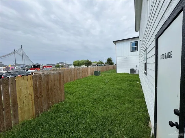 a view of a backyard with plants
