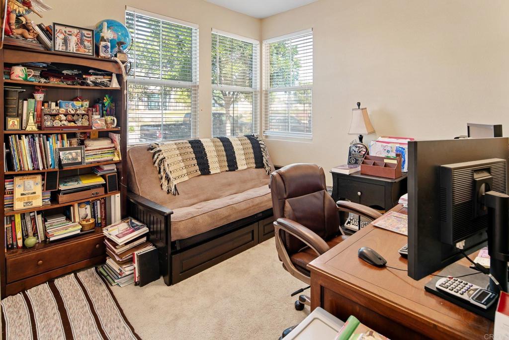 1158 Camino Prado Chula Vista, CA 91913 - Photo 12 of 25 a living room with furniture and a window