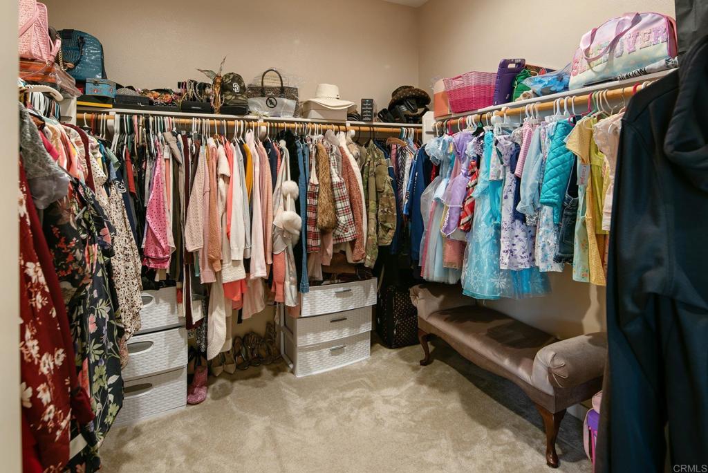 1158 Camino Prado Chula Vista, CA 91913 - Photo 14 of 25 a view of walk in closet with clothes