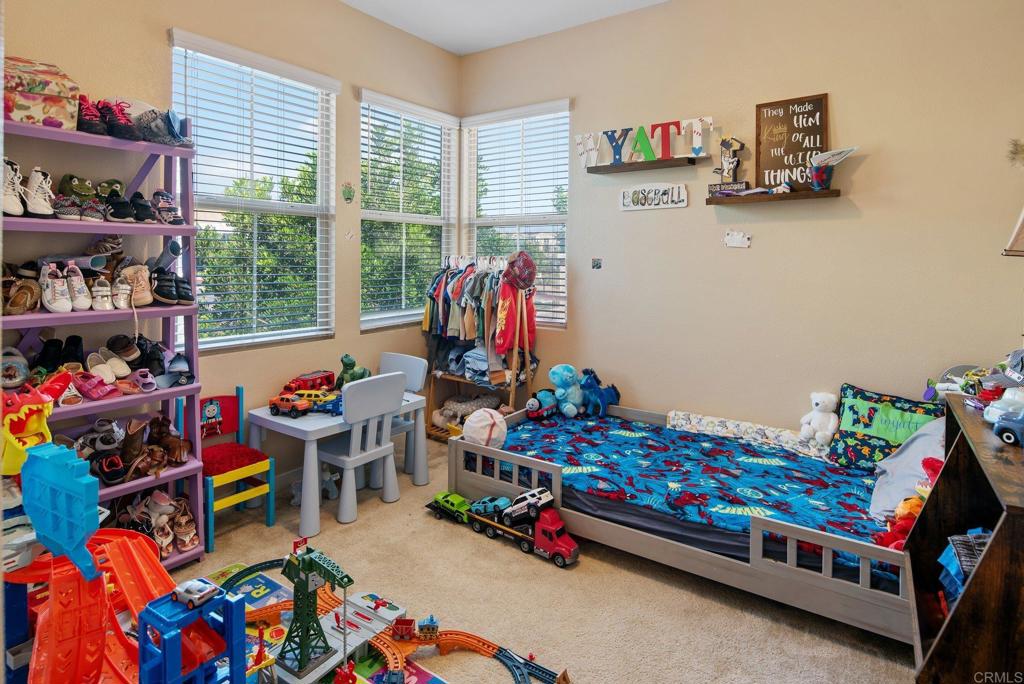 1158 Camino Prado Chula Vista, CA 91913 - Photo 17 of 25 a room with toys and storage space