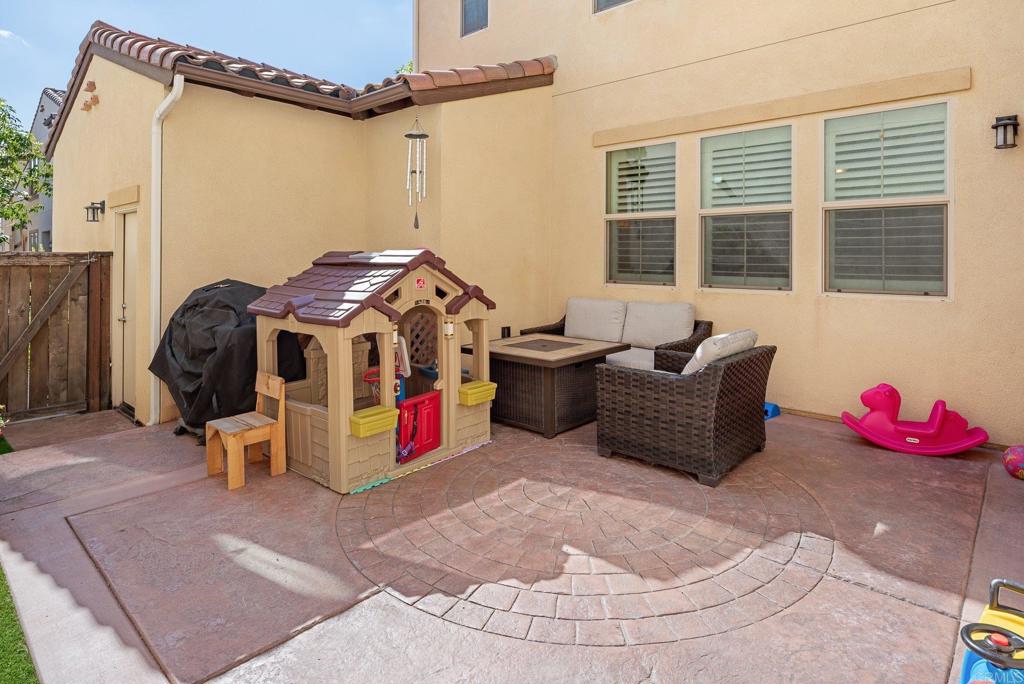 1158 Camino Prado Chula Vista, CA 91913 - Photo 22 of 25 a bed room with a bed and a chair