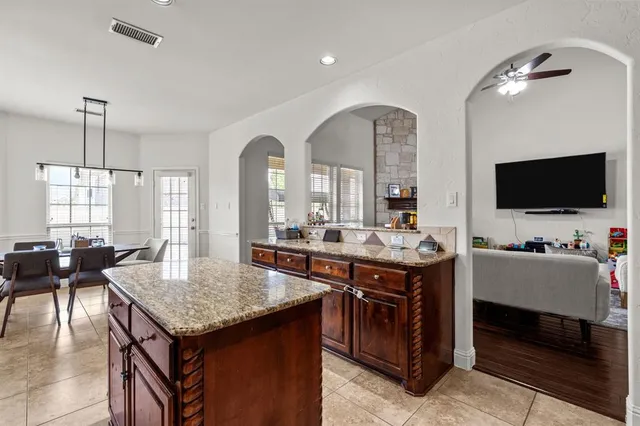 a kitchen with a stove and a microwave
