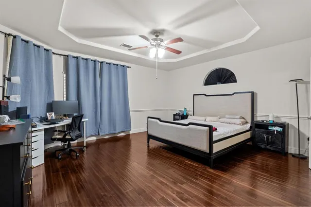 a kitchen with a sink and a refrigerator