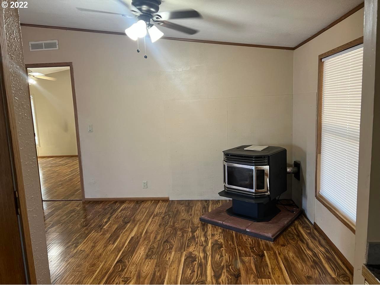 1998 McDonald Court Springfield, OR 97477 - Photo 5 of 19 a bedroom with a bed and a microwave
