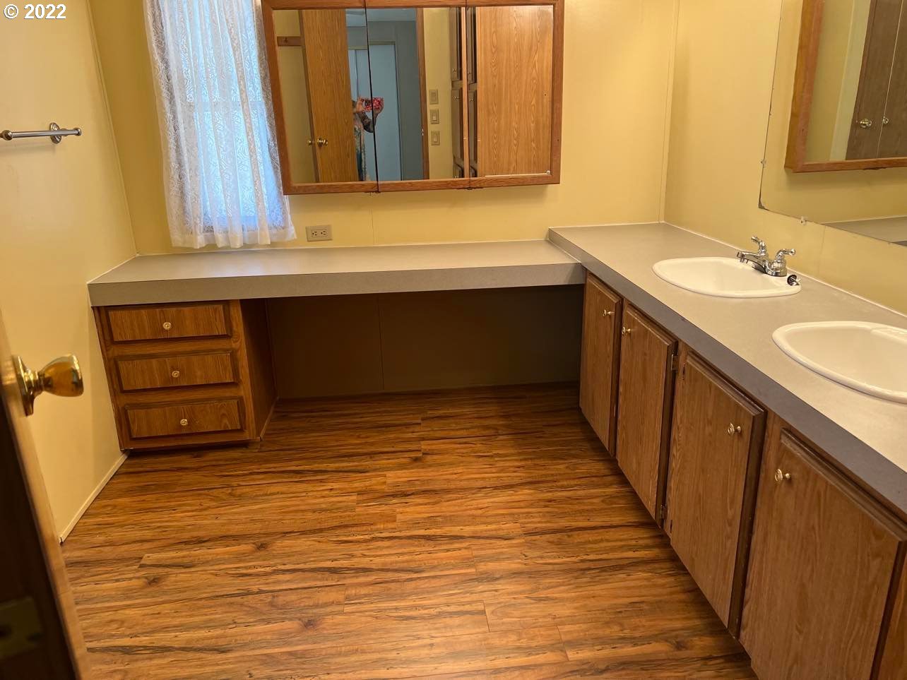1998 McDonald Court Springfield, OR 97477 - Photo 9 of 19 a bathroom with a sink and a mirror