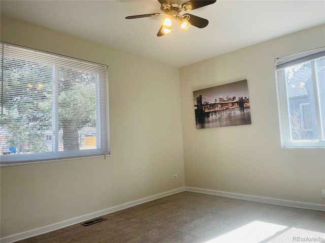 a view of a room with a large window