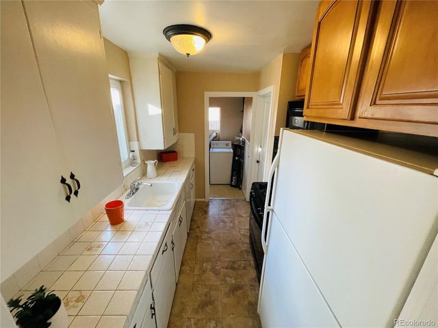 a bathroom with a tub and shower