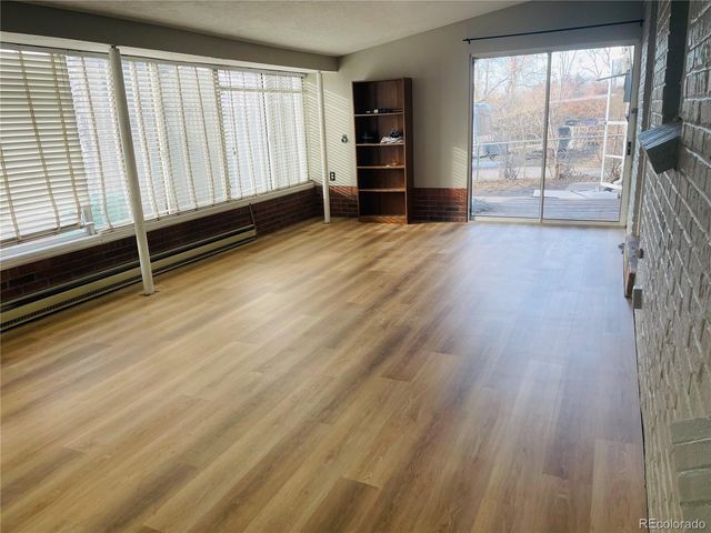 an empty room with windows