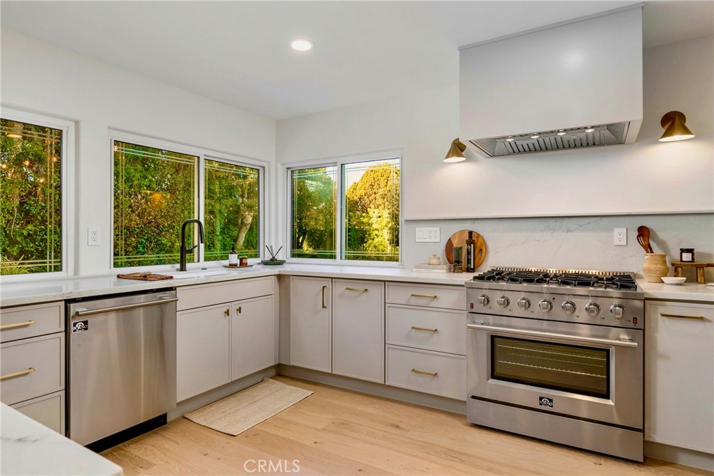 3383 Marigold Circle Costa Mesa, CA 92626 - Photo 12 of 43 a kitchen with a stove oven and sink