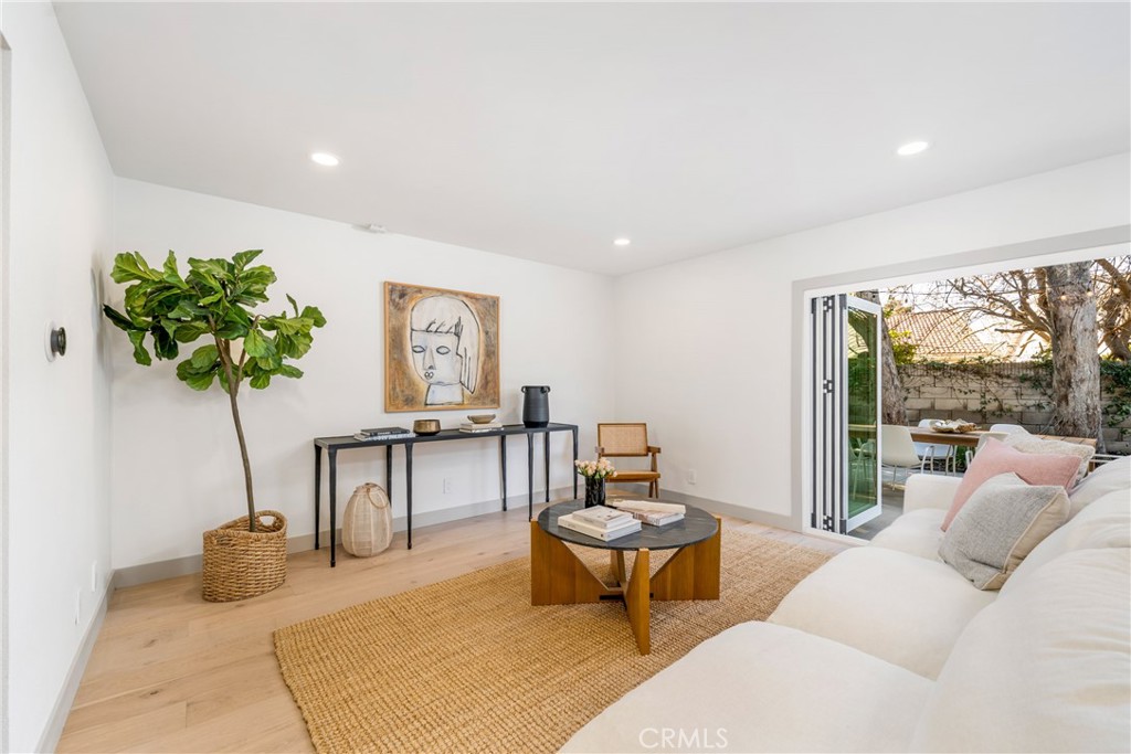 3383 Marigold Circle Costa Mesa, CA 92626 - Photo 15 of 43 a living room with furniture and a potted plant