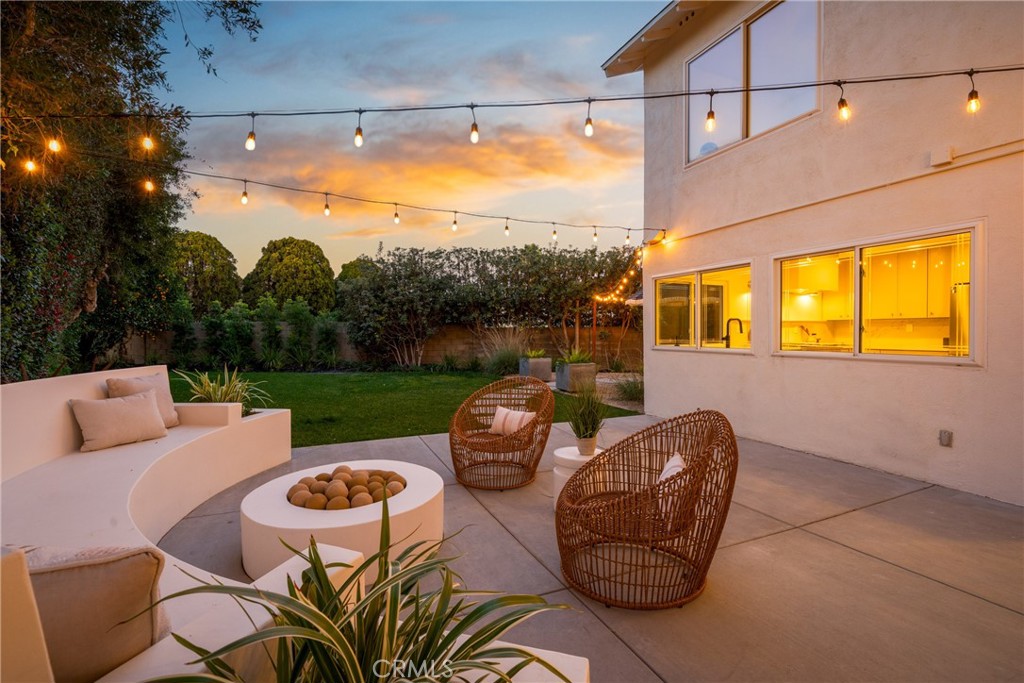 3383 Marigold Circle Costa Mesa, CA 92626 - Photo 2 of 43 a balcony with table and chairs