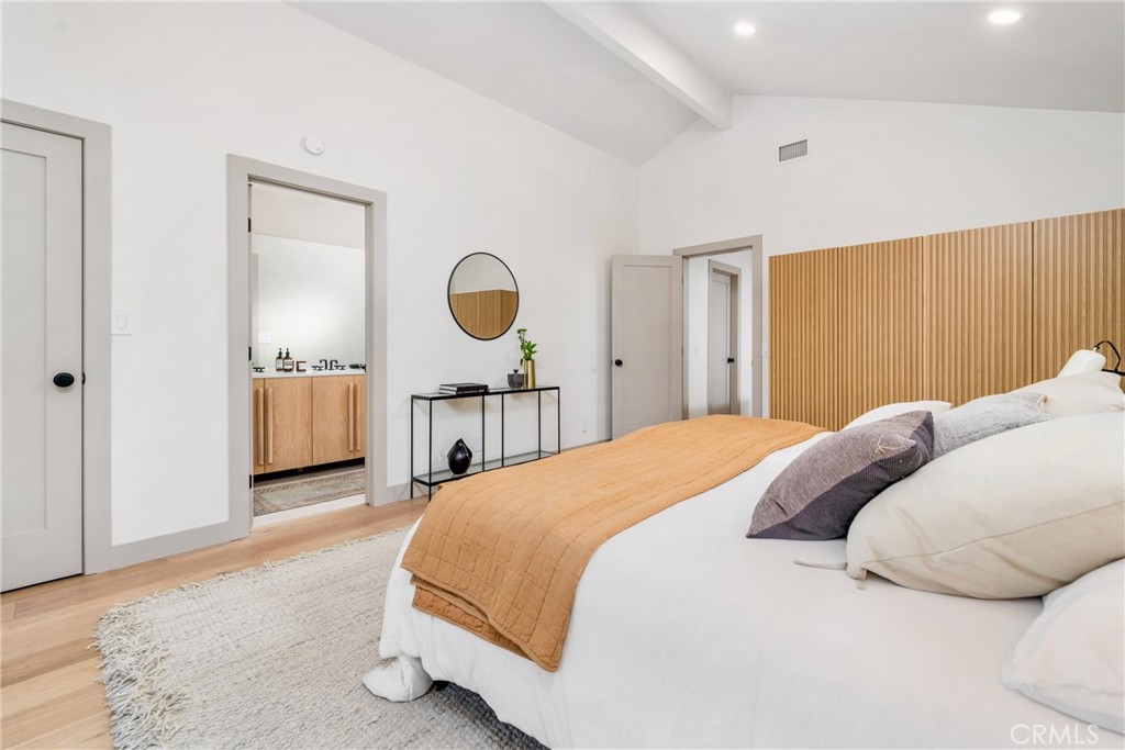 3383 Marigold Circle Costa Mesa, CA 92626 - Photo 24 of 43 a bedroom with a bed and cabinets