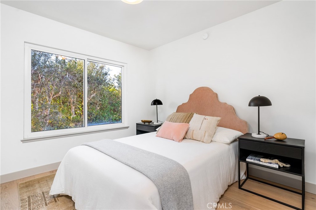 3383 Marigold Circle Costa Mesa, CA 92626 - Photo 28 of 43 a bedroom with a bed and a window