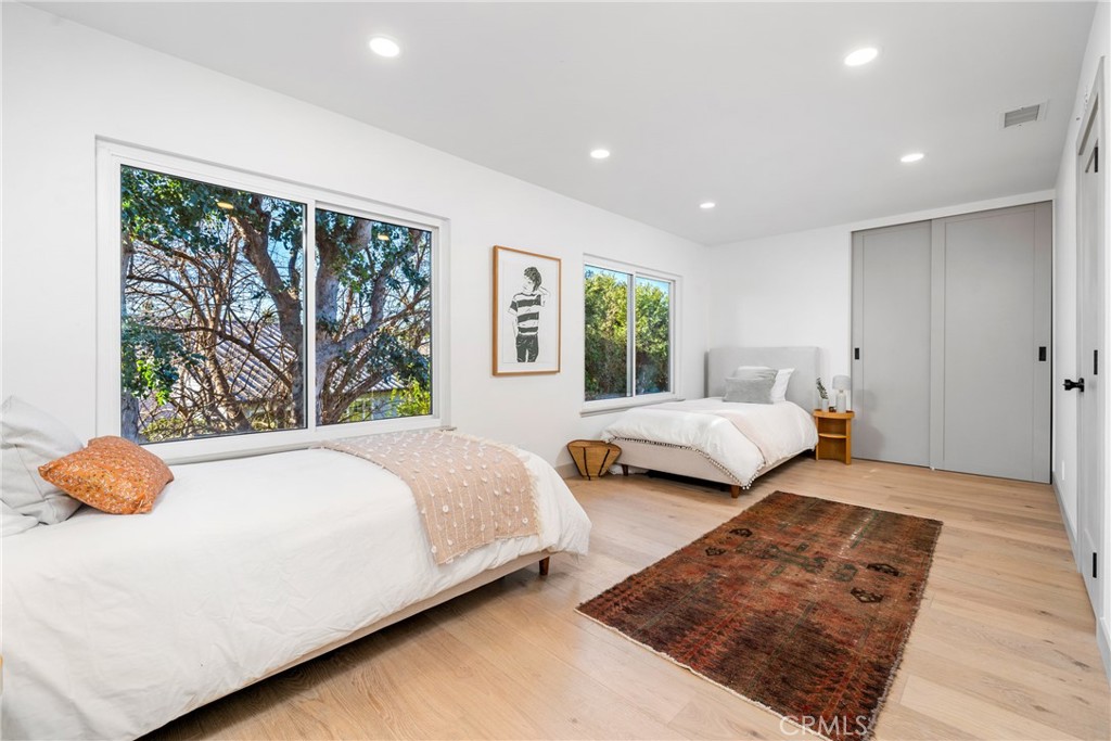 3383 Marigold Circle Costa Mesa, CA 92626 - Photo 30 of 43 a bedroom with a bed and window