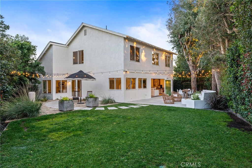 3383 Marigold Circle Costa Mesa, CA 92626 - Photo 35 of 43 a front view of a house with a yard porch and sitting area