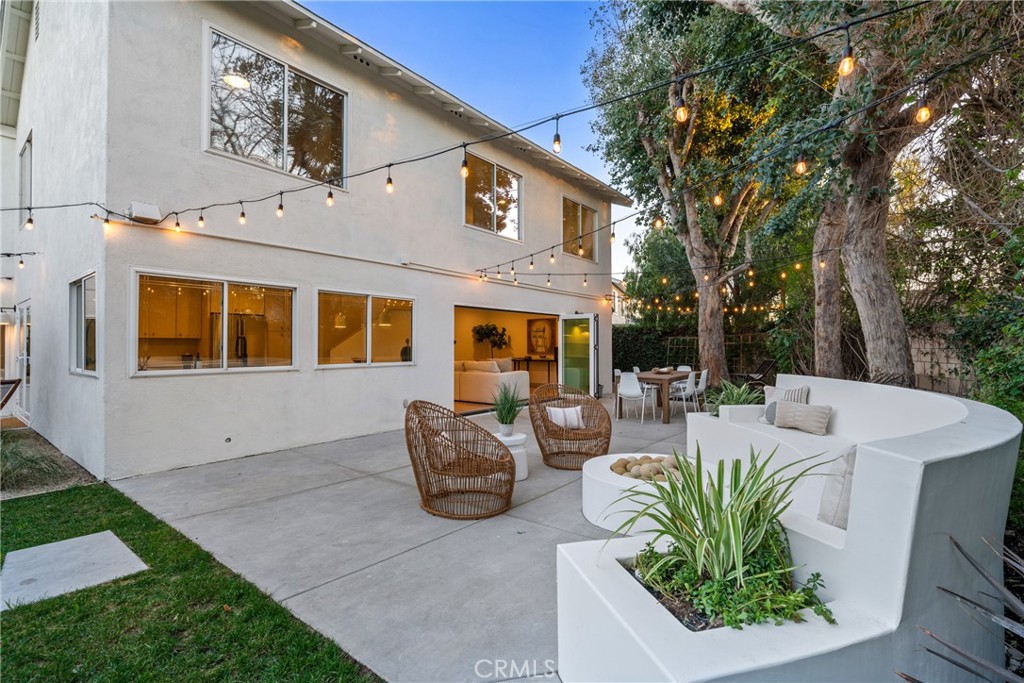 3383 Marigold Circle Costa Mesa, CA 92626 - Photo 38 of 43 a view of a patio with couches table and chairs with wooden fence