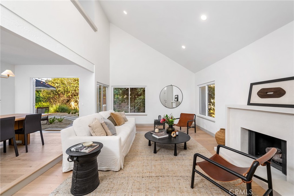 3383 Marigold Circle Costa Mesa, CA 92626 - Photo 4 of 43 a living room with fireplace furniture and a large window