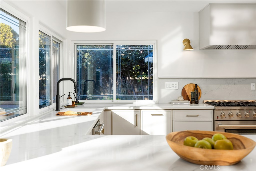 3383 Marigold Circle Costa Mesa, CA 92626 - Photo 9 of 43 a kitchen with a sink and a large window