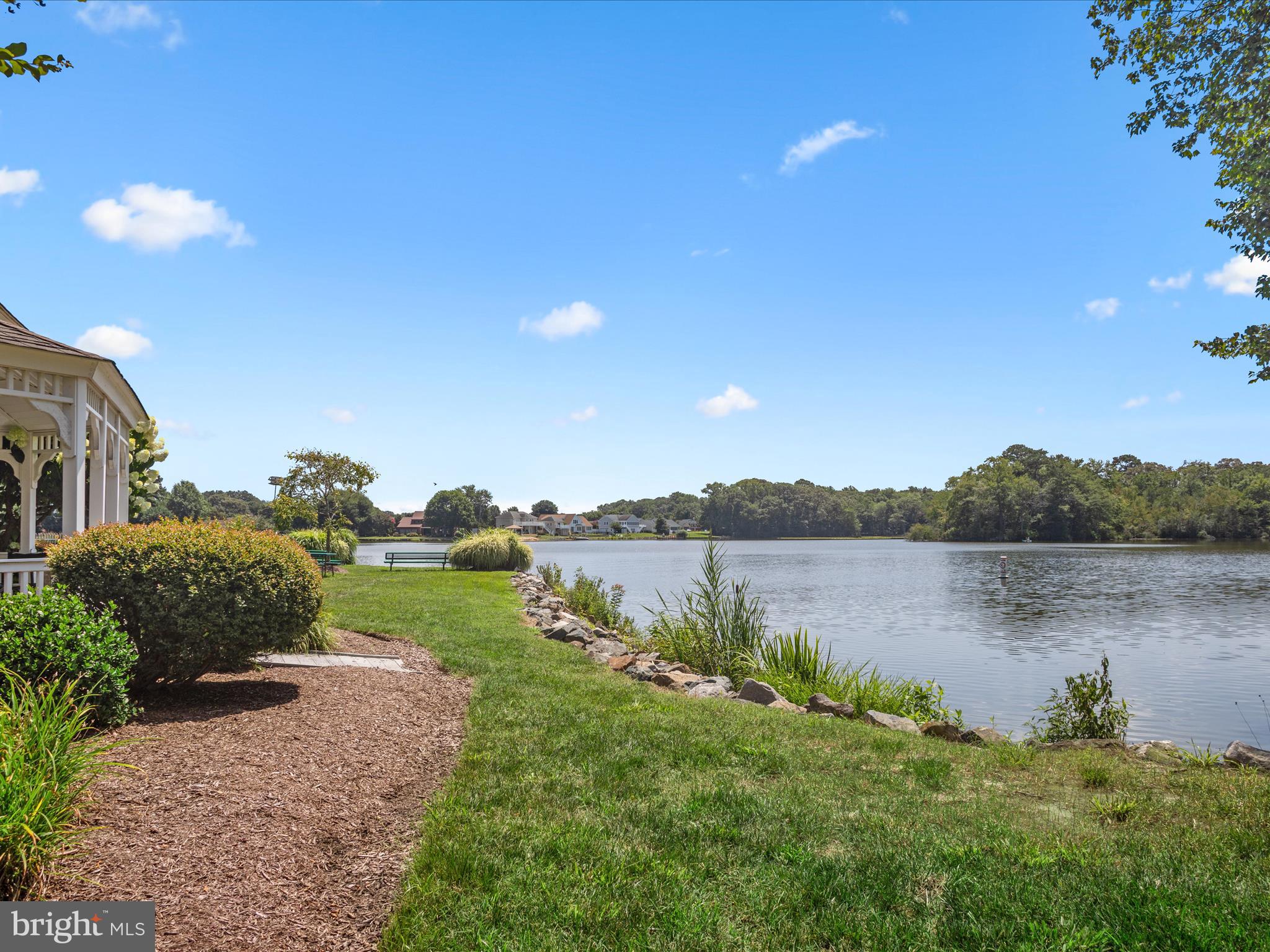 16869 West Randor Drive Milton, DE 19968 - Photo 62 of 76 a view of a lake and green valley
