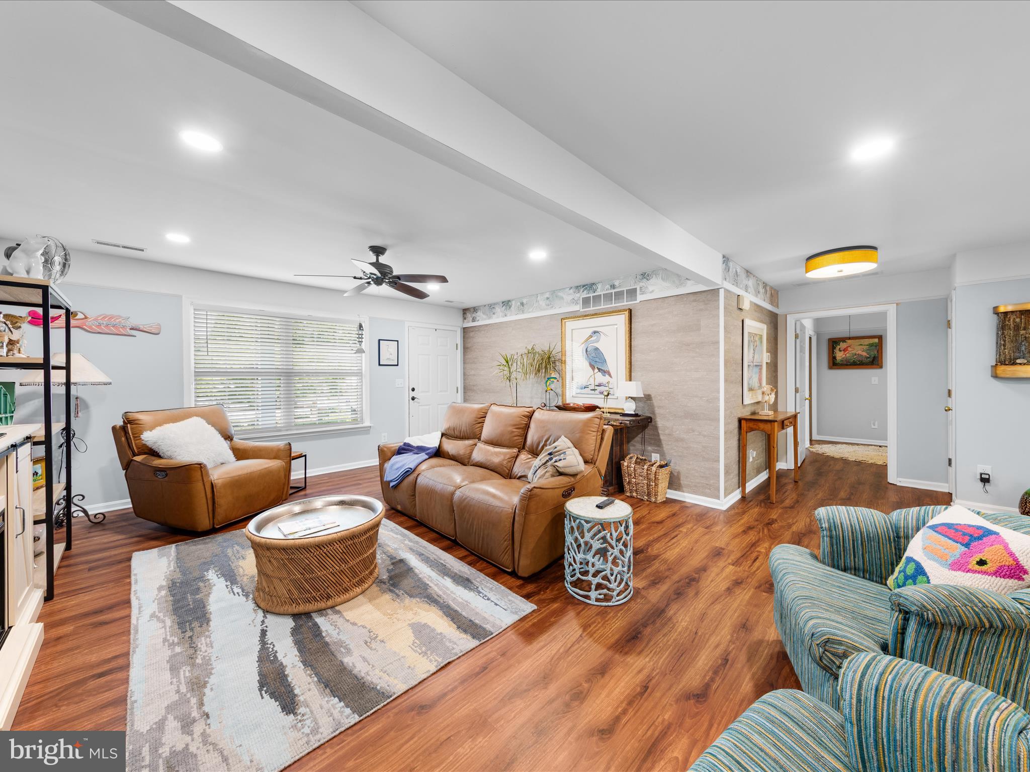 16869 West Randor Drive Milton, DE 19968 - Photo 7 of 76 a living room with furniture and a wooden floor