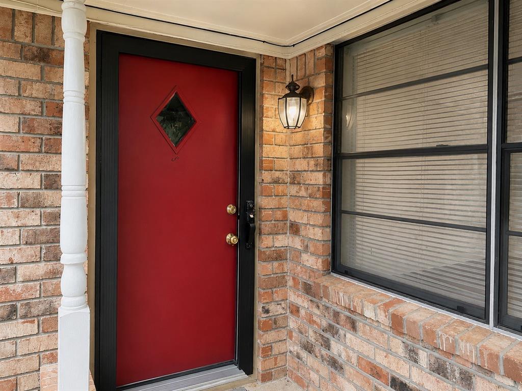 2111 Quail Run, Unit A McKinney, TX 75071 - Photo 2 of 12 a view of door
