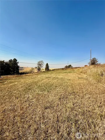 a backyard of a house with seating space