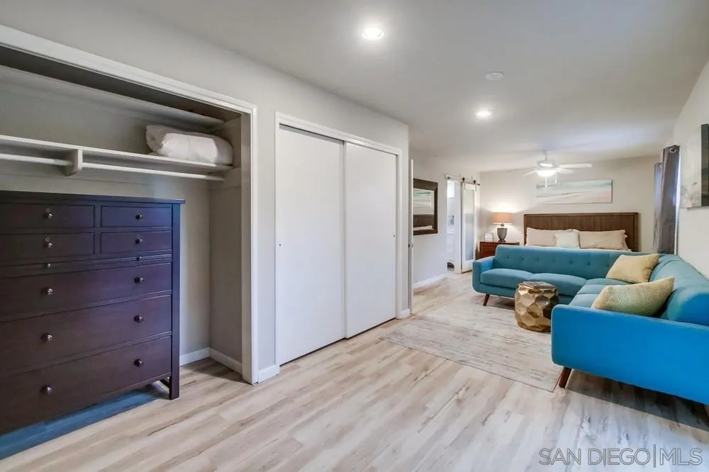 426 Phillips Way Vista, CA 92083 - Photo 56 of 74 a living room with furniture and wooden floor