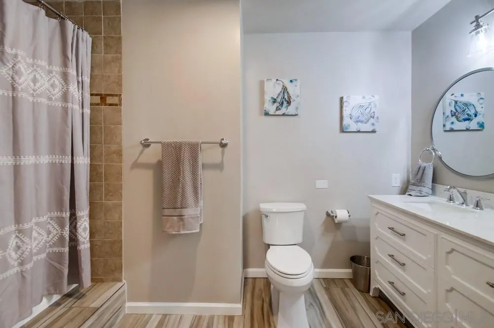 426 Phillips Way Vista, CA 92083 - Photo 68 of 74 a bathroom with a toilet sink and shower