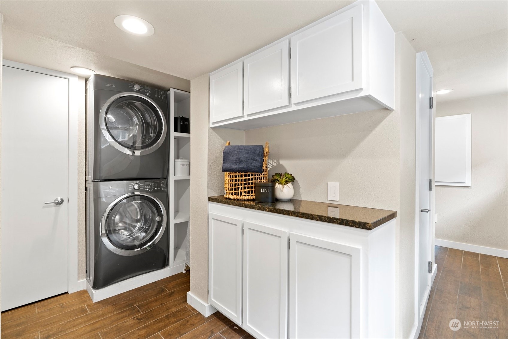 820 North 60th Street Seattle, WA 98103 - Photo 15 of 30 a view of washer and dryer in a utility room