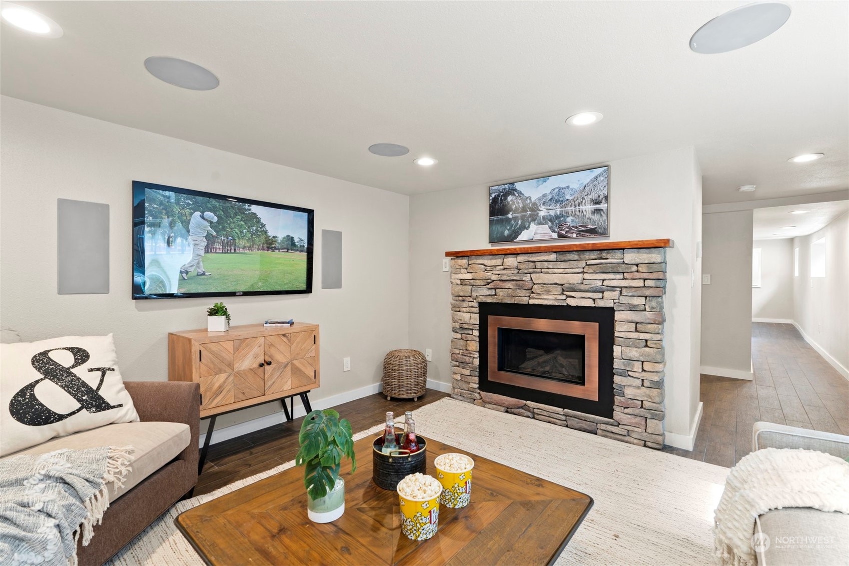 820 North 60th Street Seattle, WA 98103 - Photo 16 of 30 a living room with furniture and a fireplace