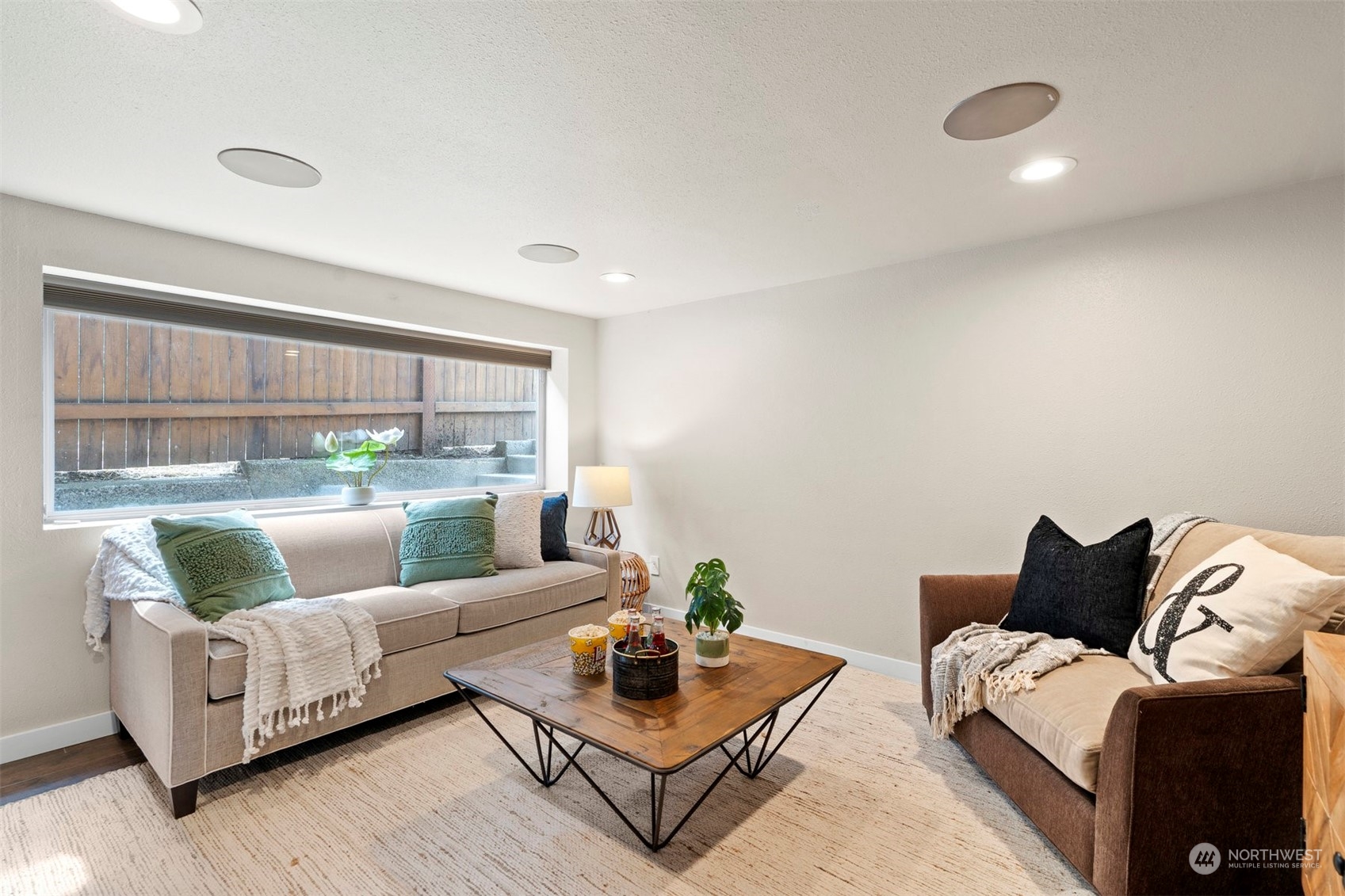 820 North 60th Street Seattle, WA 98103 - Photo 17 of 30 a living room with furniture and a window