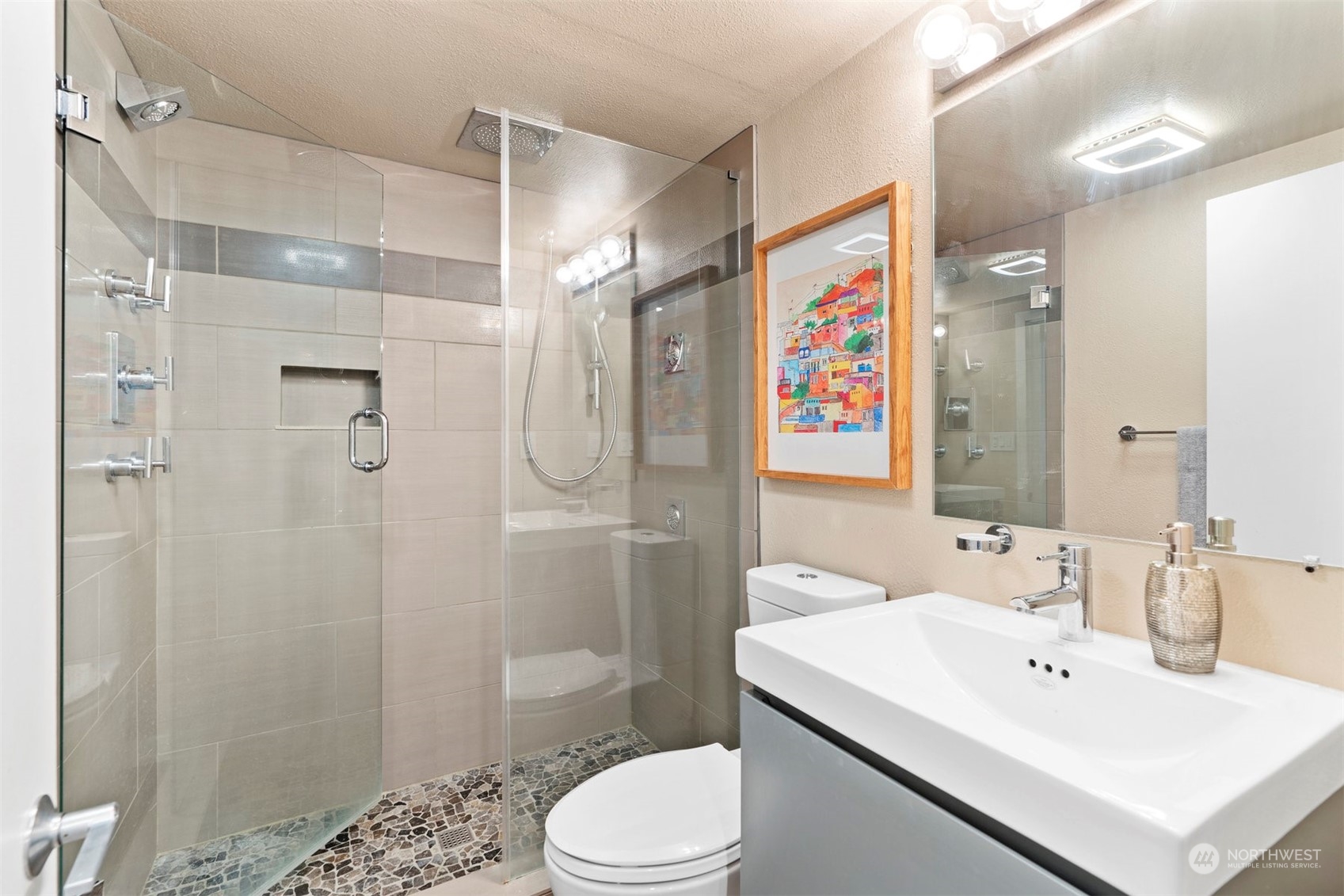 820 North 60th Street Seattle, WA 98103 - Photo 24 of 30 a bathroom with a sink toilet and shower
