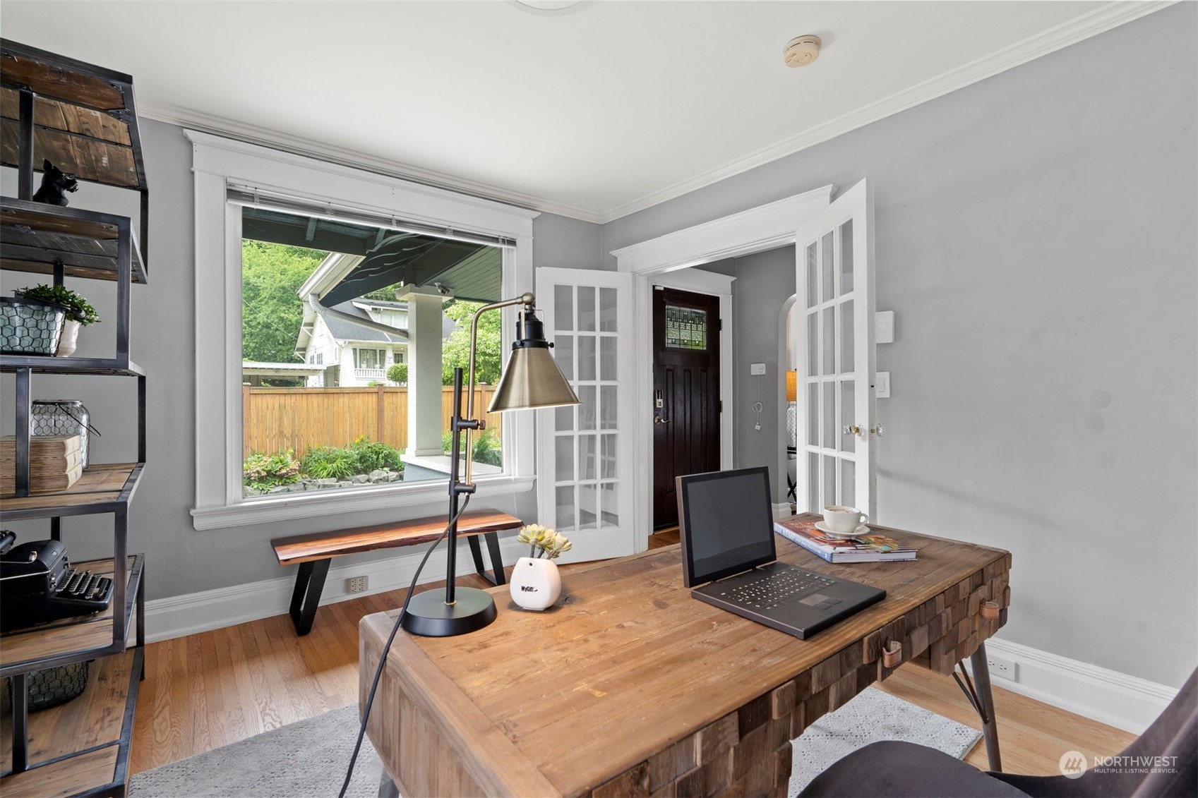 820 North 60th Street Seattle, WA 98103 - Photo 6 of 30 a view of a workspace with furniture and a window