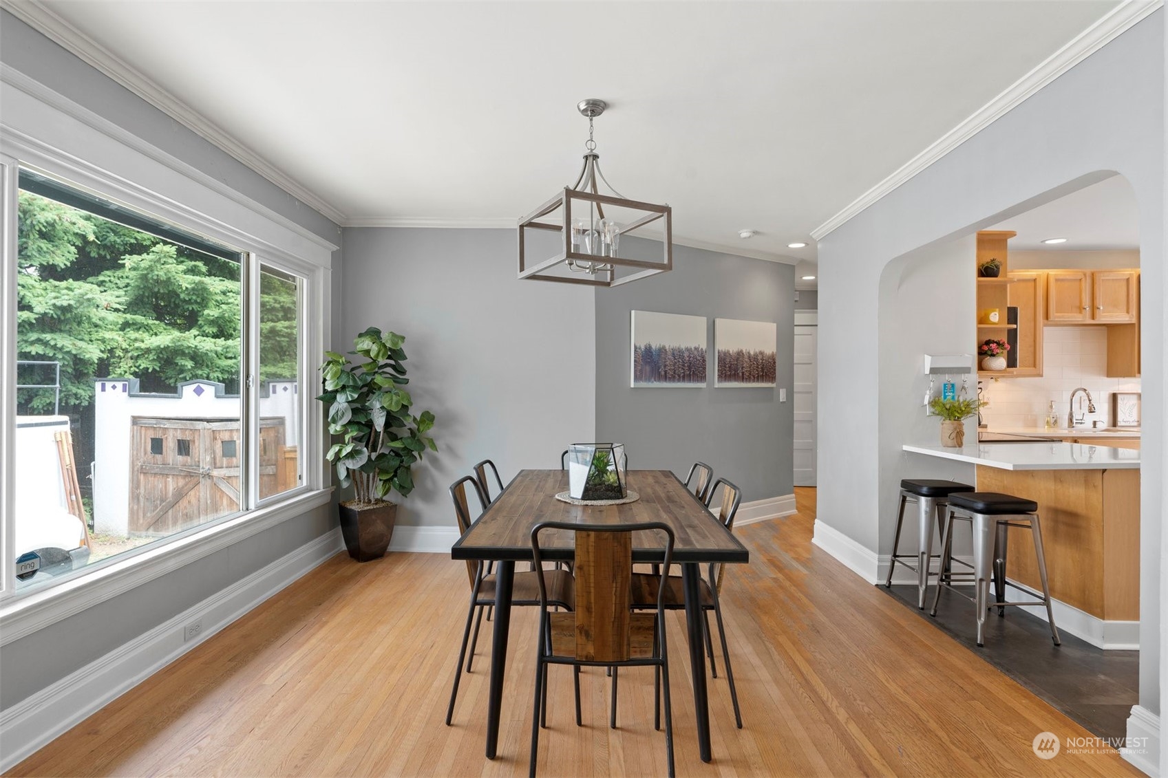 820 North 60th Street Seattle, WA 98103 - Photo 7 of 30 a view of a dining room with furniture window and wooden floor