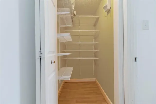 a bathroom with a glass door shower